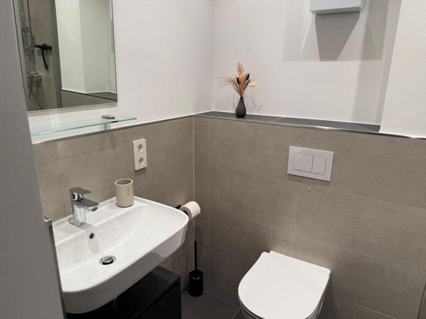 *Bad mit Dusche Wohnung Marlon*